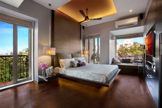 Гипсокартон - действительно универсальный материал для потолка в спальне 