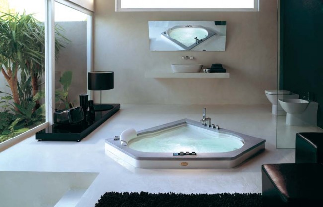 Современная угловая ванна отлично впишется в стиль хай-тек