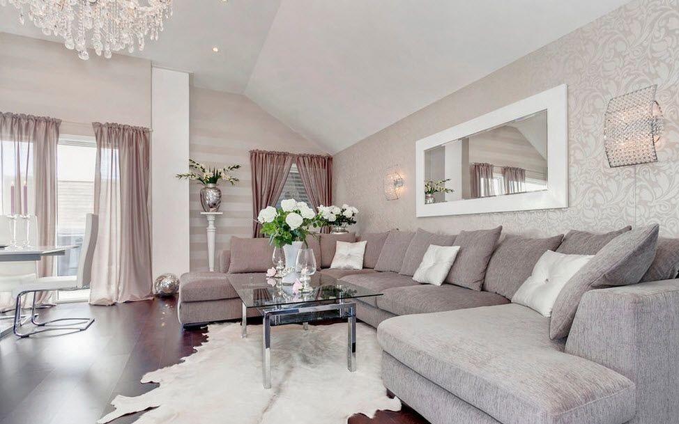 Прекрасный вариант для современной гостиной - это стильный угловой диван с красивыми подушками