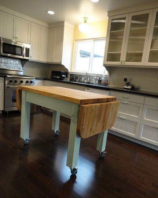 Стильный дизайн мобильного кухонного острова с откидной деревянной столешницей