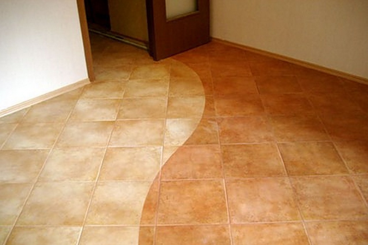 Плитка на полу кухни может быть подобрана в соответствии с будущим дизайном.
