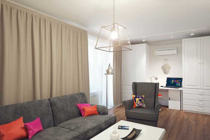 Серый диван из IKEA в интерьере маленькой гостиной