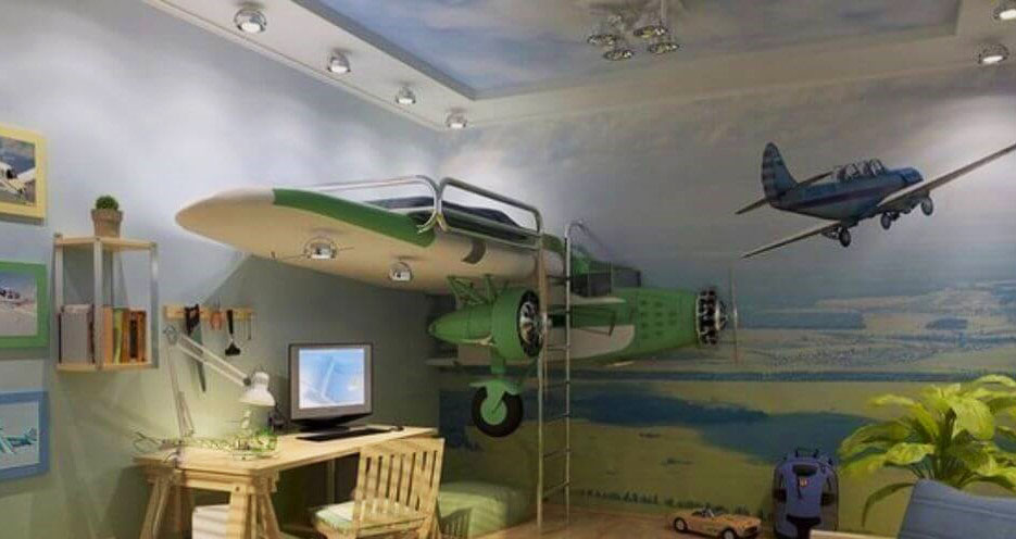 Стильная комната мальчика в авиа стиле с кроватью в виде крыла самолёта