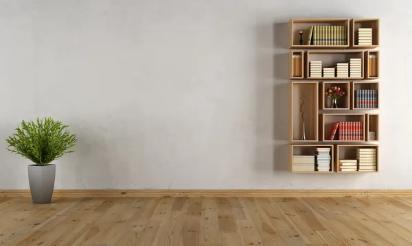 Пустой интерьер со стенным книжным шкафом — стоковое фото