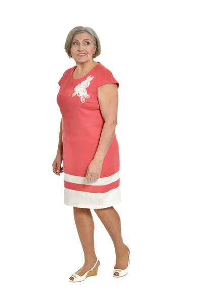 Старшие женщины в коралловых платье — стоковое фото