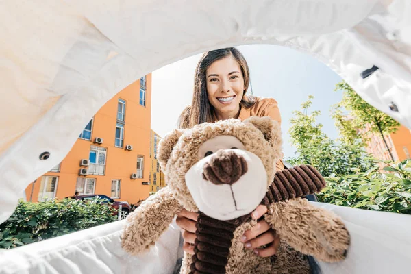 Happy Mother Holding Teddy Bear Baby Stroller — стоковое фото