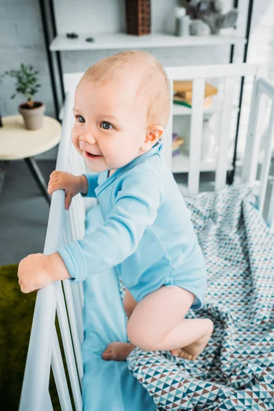 High Angle View Happy Little Baby Standing Crib — стоковое фото