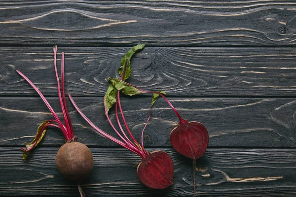Small Red Beetroots Dark Wooden Table — стоковое фото