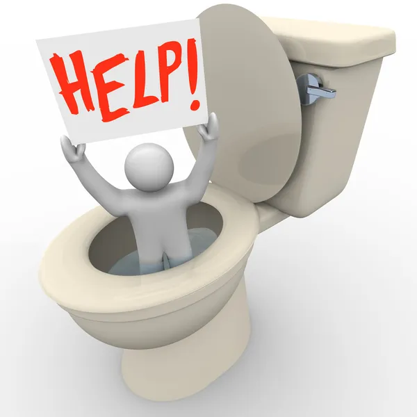 Человек всунул туалет, держащий знак помощи - чрезвычайный SOS — стоковое фото