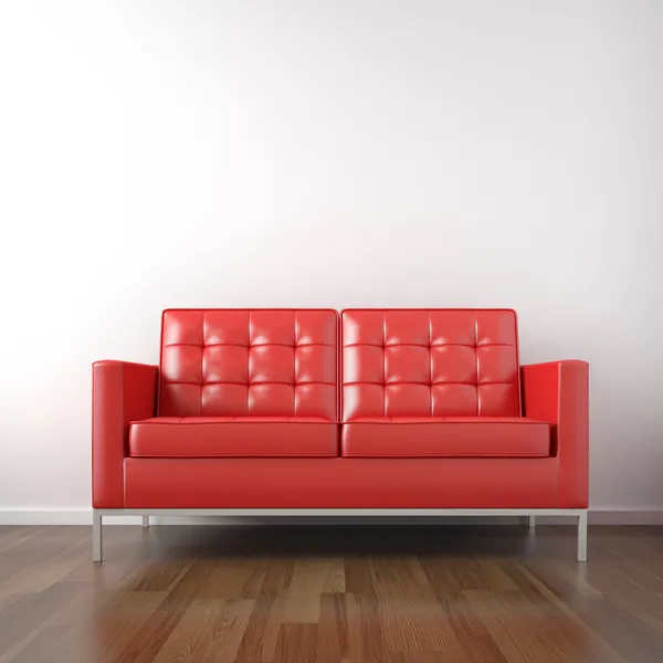 Красный диван в белой комнате — стоковое фото